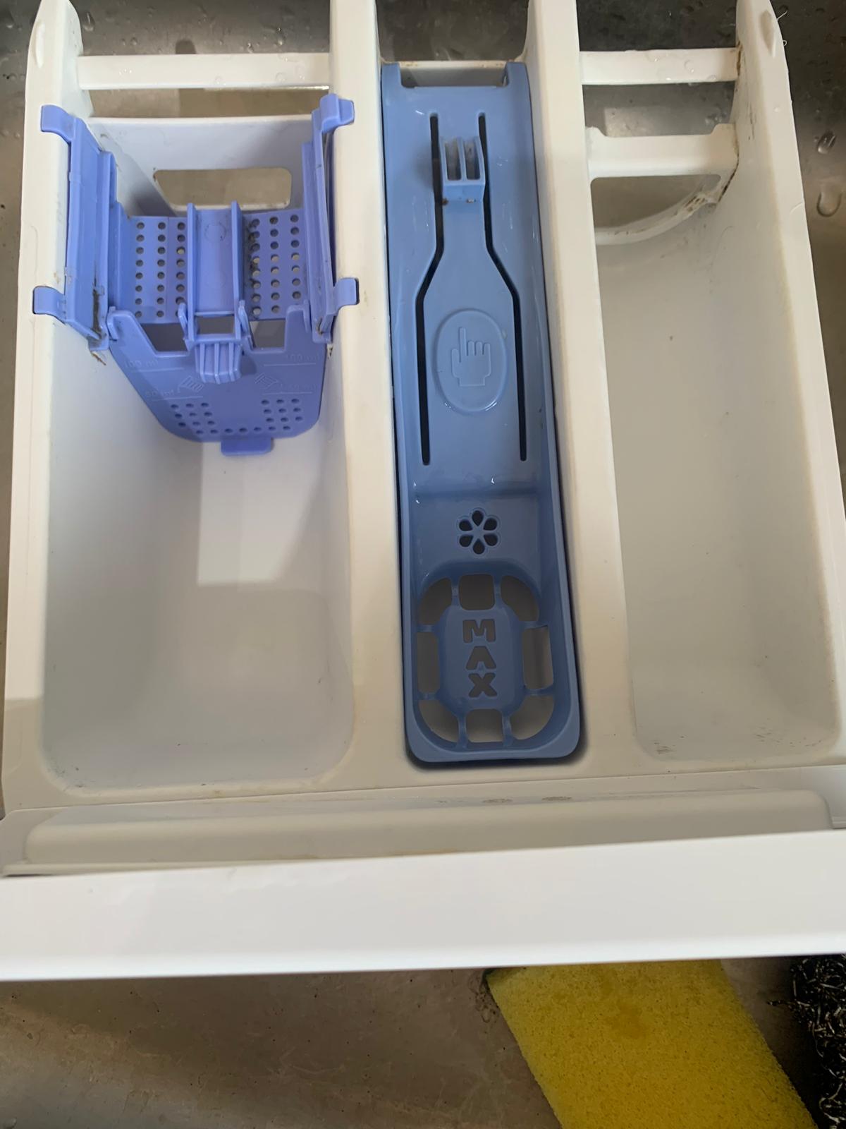 Washing machine drawer cleaning