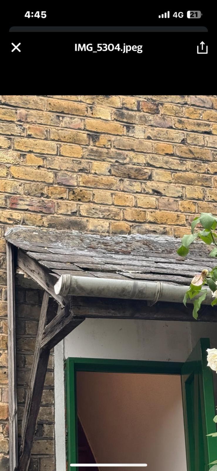 Front door canopy before